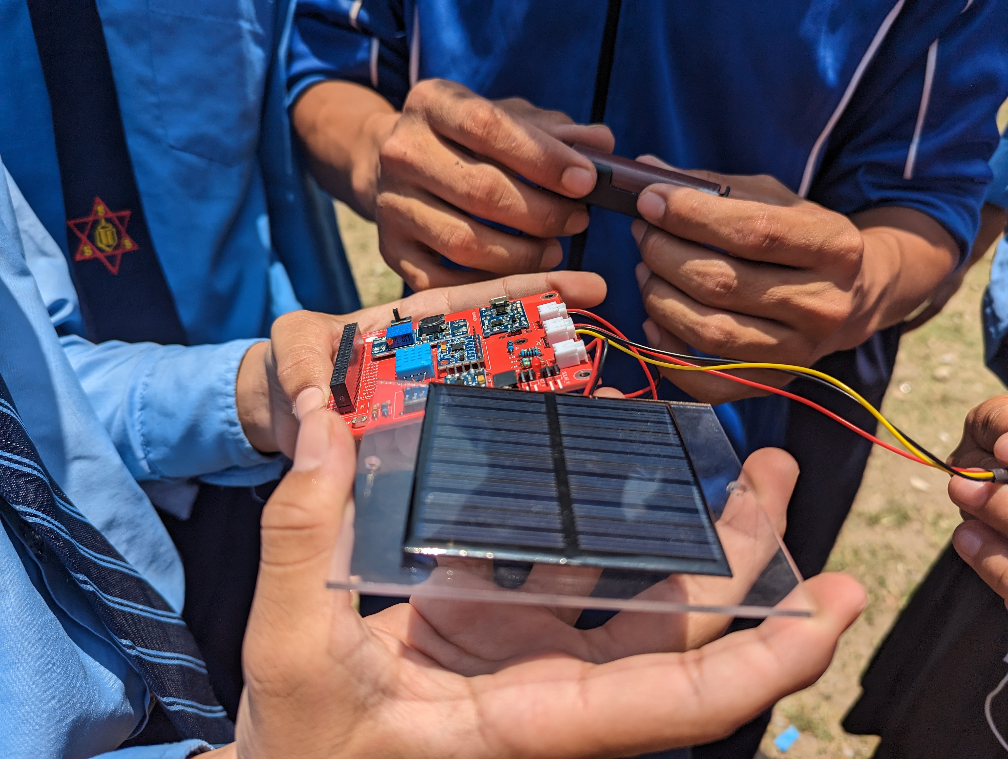 Student performing solar charge test